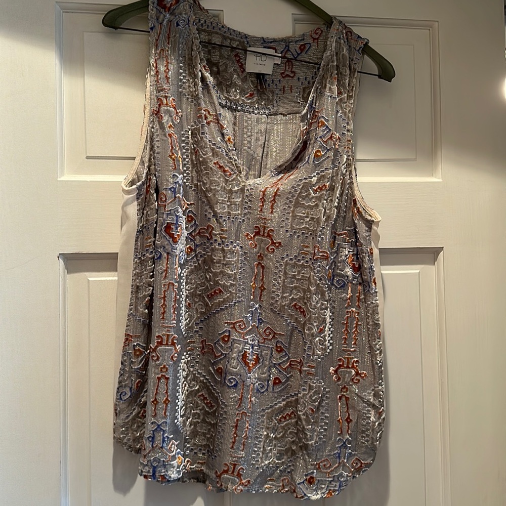 V-neck sexy, sheer and velour tank. Easy to dress up or down.